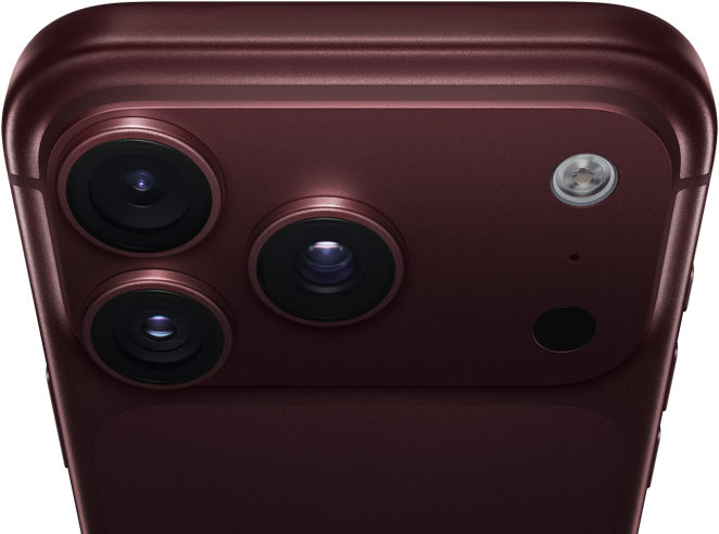 iPhone 18 Pro, burgundy color, rounded edges and corners, partial back exterior angled to show Pro Fusion camera system in top left corner, three lenses, microphone, flash